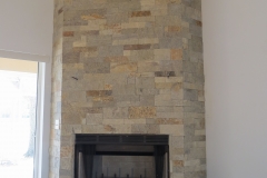 Dry-stack veneer with sandstone hearth