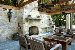Quartzite stone fireplace and walls in daylight