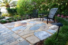 Dry-laid flagstone patio in garden