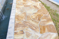 Flagstone patio at infiniti edge pool