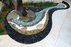 Water column with pebble mosaic
