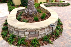 Natural and cultured stone retaining wall